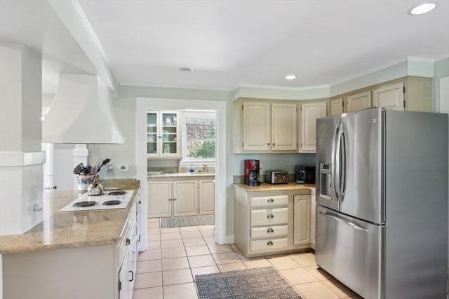10 Orchard Rd, Gloucester, MA 01930 - kitchen with stainless steel fridge with ice dispenser, custom exhaust hood, ornamental molding, light tile patterned floors, and recessed lighting