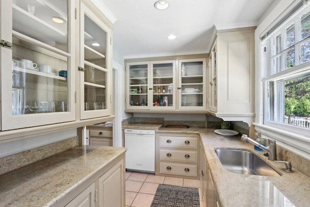 10 Orchard Rd, Gloucester, MA 01930 - kitchen featuring dishwasher, a sink, light tile patterned flooring, light stone counters, and glass insert cabinets