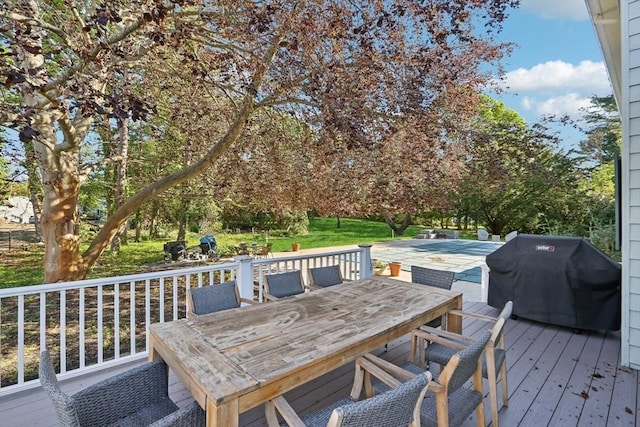 10 Orchard Rd, Gloucester, MA 01930 - wooden deck featuring area for grilling and outdoor dining area