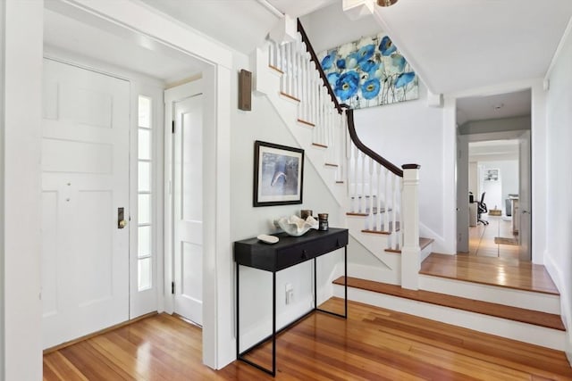 10 Orchard Rd, Gloucester, MA 01930 - entryway featuring hardwood / wood-style flooring, stairs, and baseboards