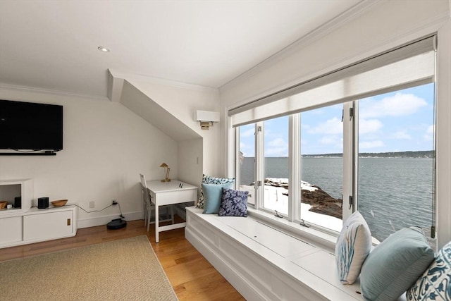 bedroom with light wood-type flooring, a water view, baseboards, and crown molding