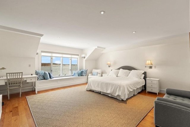 bedroom featuring recessed lighting and light wood-style flooring