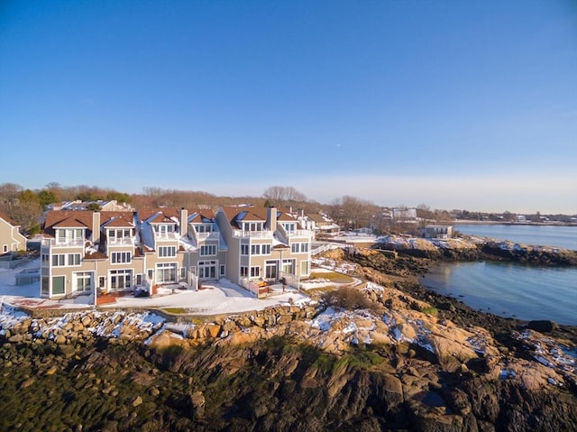 aerial view with a residential view and a water view