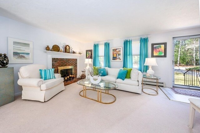 carpeted living room featuring a fireplace and a baseboard radiator