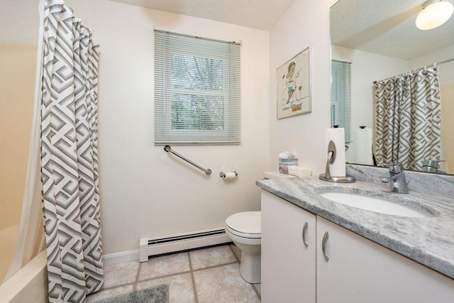 bathroom featuring vanity, toilet, baseboards, tile patterned flooring, and baseboard heating