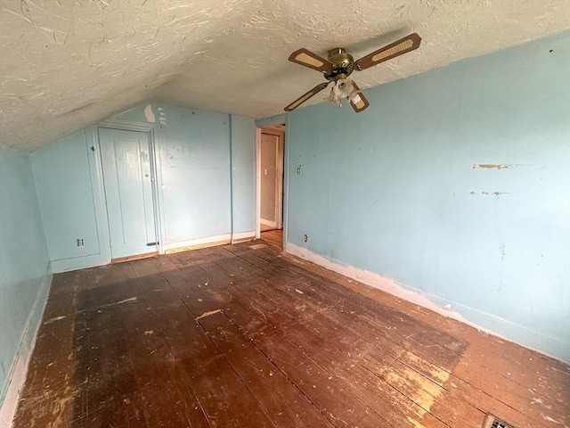 233 Grove St, Woonsocket, RI 02895 - additional living space with wood-type flooring, a textured ceiling, baseboards, a ceiling fan, and lofted ceiling