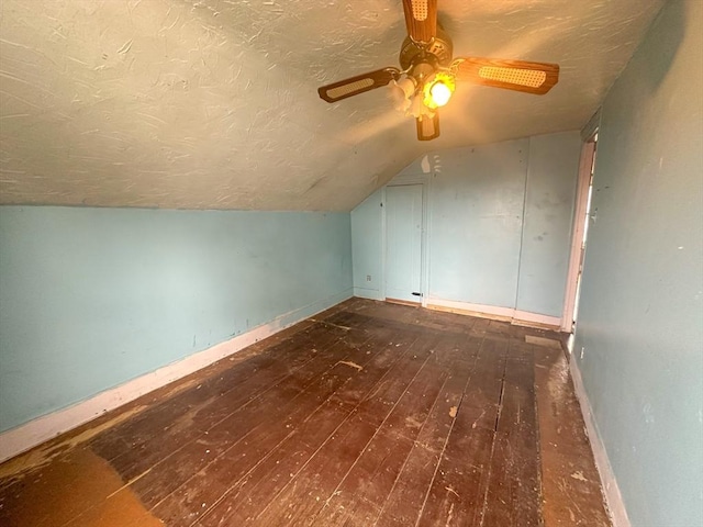 233 Grove St, Woonsocket, RI 02895 - bonus room with lofted ceiling, wood-type flooring, a textured ceiling, ceiling fan, and baseboards