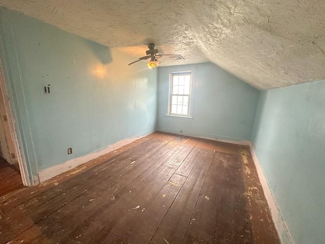 233 Grove St, Woonsocket, RI 02895 - bonus room with hardwood / wood-style flooring, a textured ceiling, lofted ceiling, baseboards, and ceiling fan