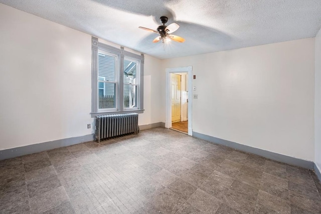 72 Hall St, Springfield, MA 01108 - unfurnished room with radiator, ceiling fan, and a textured ceiling