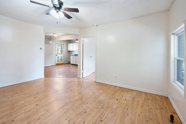 72 Hall St, Springfield, MA 01108 - spare room with light wood-type flooring and ceiling fan