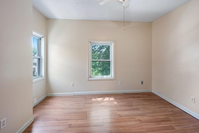 72 Hall St, Springfield, MA 01108 - spare room with light wood-style floors and a ceiling fan