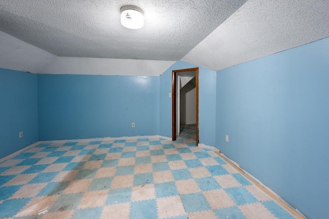 72 Hall St, Springfield, MA 01108 - additional living space with lofted ceiling and a textured ceiling