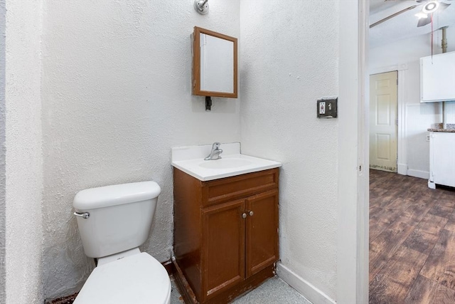 72 Hall St, Springfield, MA 01108 - bathroom with vanity, a textured wall, ceiling fan, and wood finished floors