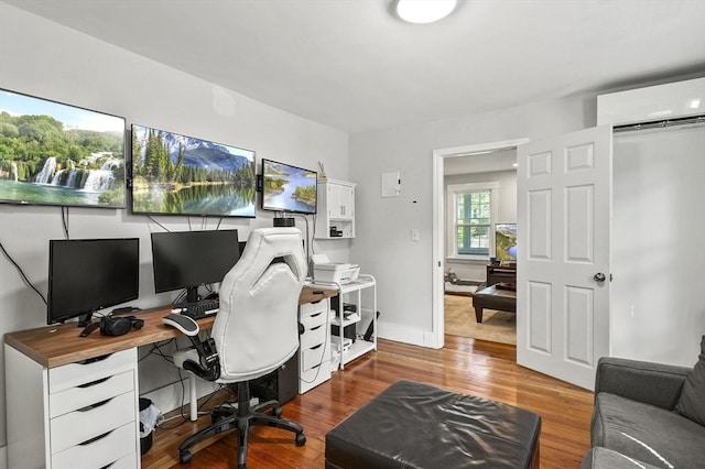 171 Boyce St, Auburn, MA 01501 - office area featuring wood finished floors and a wall mounted AC
