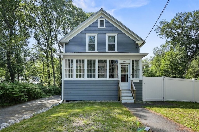 171 Boyce St, Auburn, MA 01501 - view of front of property with a sunroom and a gate