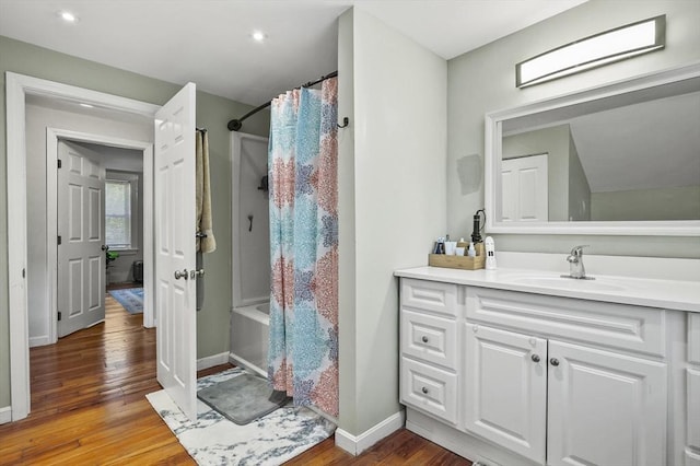 171 Boyce St, Auburn, MA 01501 - bathroom featuring wood-type flooring, vanity, shower / bath combo, and recessed lighting