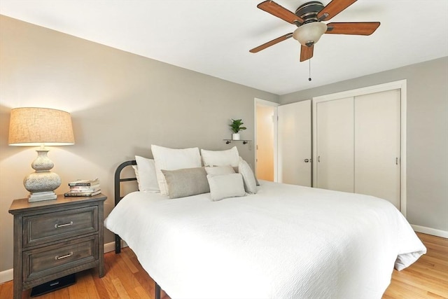 116 Anthony St, Agawam, MA 01001 - bedroom featuring a closet, light wood-style floors, baseboards, and ceiling fan