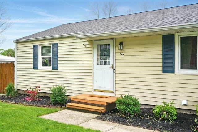 116 Anthony St, Agawam, MA 01001 - property entrance with roof with shingles