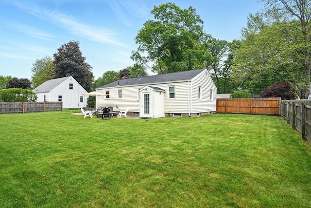 116 Anthony St, Agawam, MA 01001 - back of property with a chimney and an outbuilding