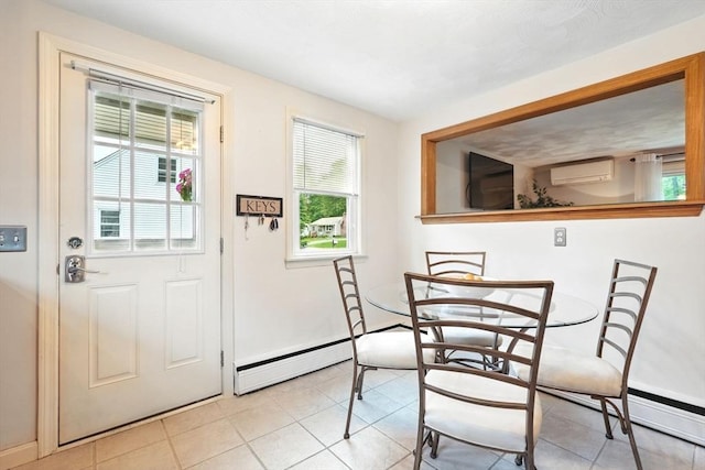 116 Anthony St, Agawam, MA 01001 - dining area featuring baseboards, a wall unit AC, light tile patterned flooring, and baseboard heating
