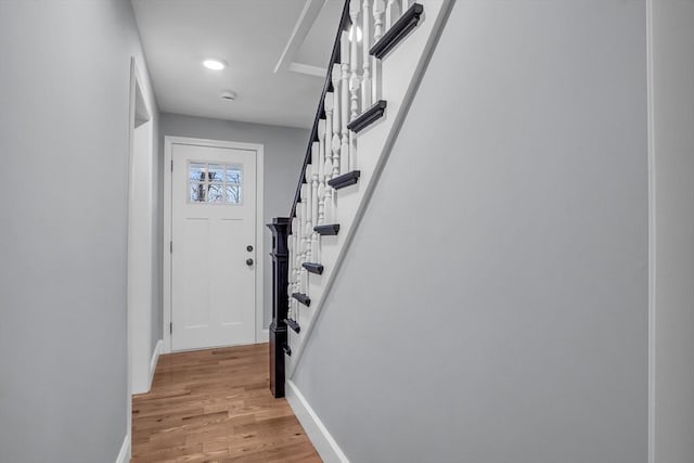 entryway with light hardwood / wood-style floors