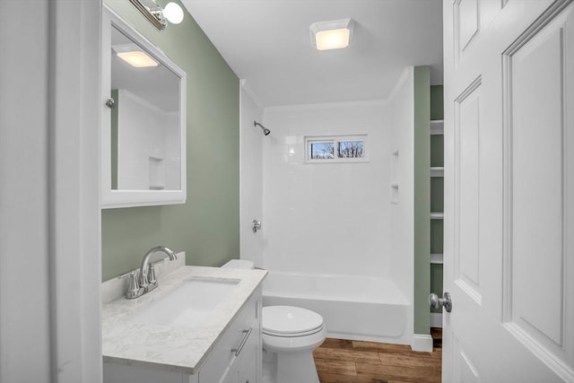 full bathroom featuring vanity,  shower combination, toilet, and wood-type flooring