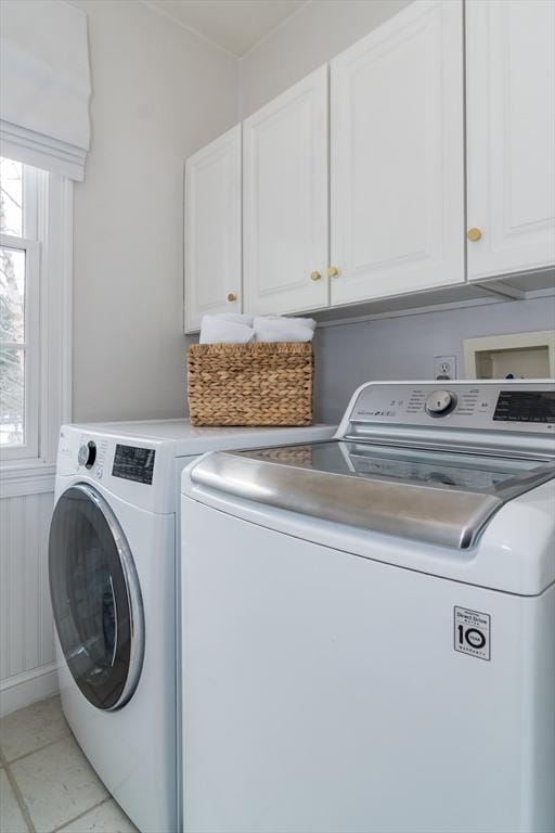 laundry area with cabinets and washer and dryer