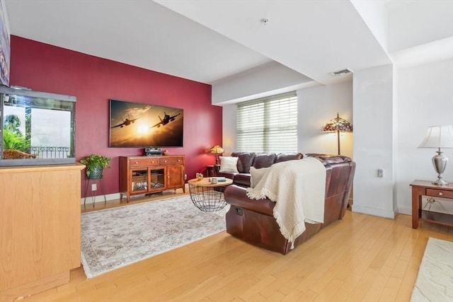 living room with hardwood / wood-style flooring