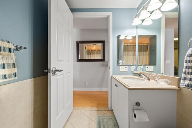 bathroom with vanity and tile patterned flooring