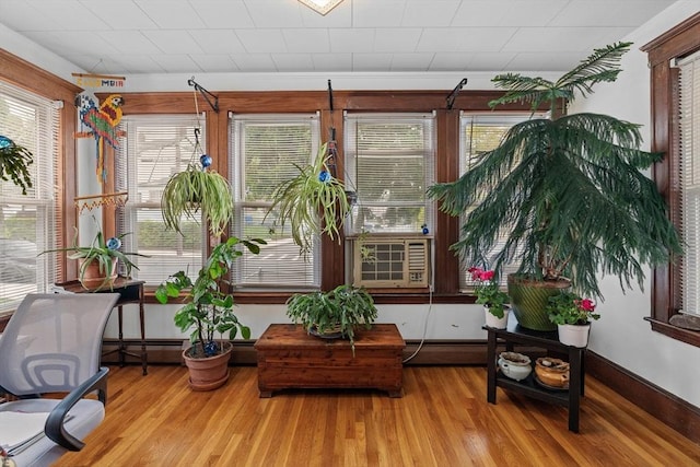 sunroom / solarium featuring cooling unit