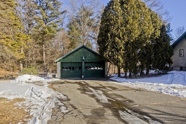 view of snow covered garage