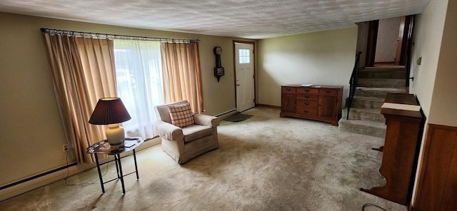 109 Wilder St, Swansea, MA 02777 - sitting room with light colored carpet, stairway, and a textured ceiling
