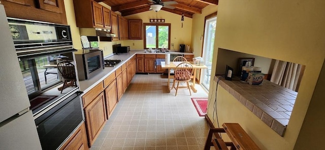 109 Wilder St, Swansea, MA 02777 - kitchen featuring brown cabinetry, light countertops, appliances with stainless steel finishes, ceiling fan, and wood ceiling