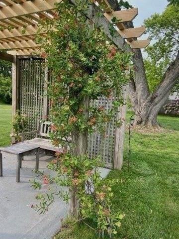 109 Wilder St, Swansea, MA 02777 - view of grassy yard featuring a pergola