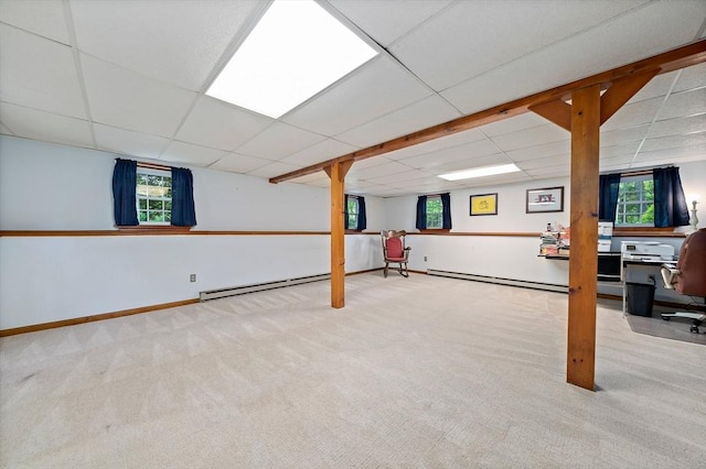 1102 State Rd, Plymouth, MA 02360 - basement with a drop ceiling, carpet, a baseboard heating unit, and plenty of natural light