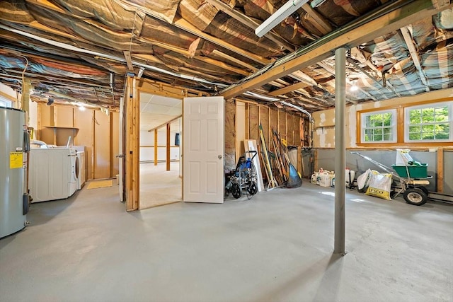 1102 State Rd, Plymouth, MA 02360 - below grade area featuring washer and dryer and electric water heater