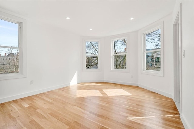 63 Oak St Unit 2, Somerville, MA 02143 - spare room featuring light wood-type flooring, recessed lighting, and baseboards