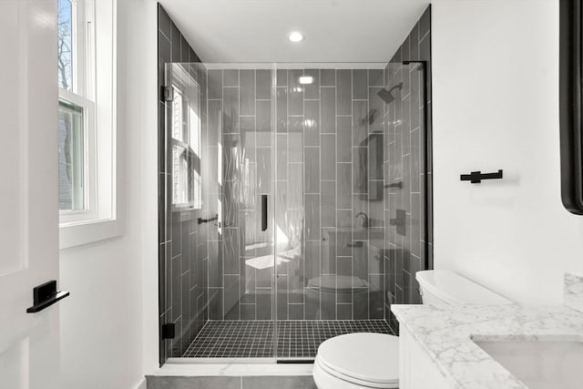 63 Oak St Unit 2, Somerville, MA 02143 - full bath with toilet, vanity, a stall shower, and recessed lighting