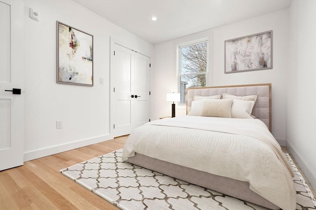 63 Oak St Unit 2, Somerville, MA 02143 - bedroom featuring light wood-type flooring, baseboards, and recessed lighting