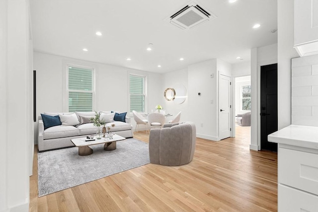 63 Oak St Unit 2, Somerville, MA 02143 - living room with light wood-style floors, recessed lighting, and baseboards