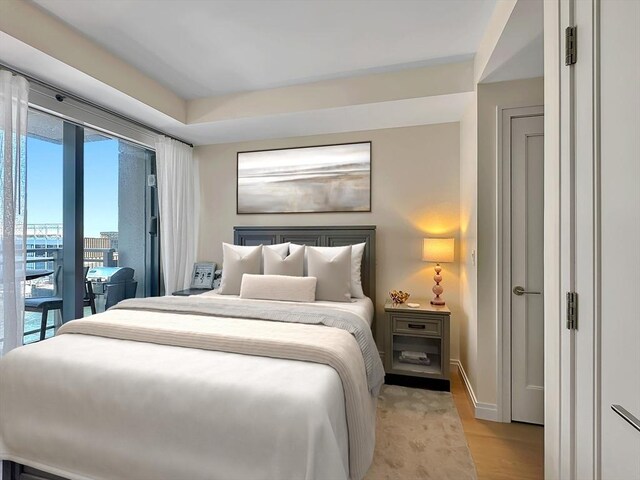 bedroom featuring light hardwood / wood-style floors