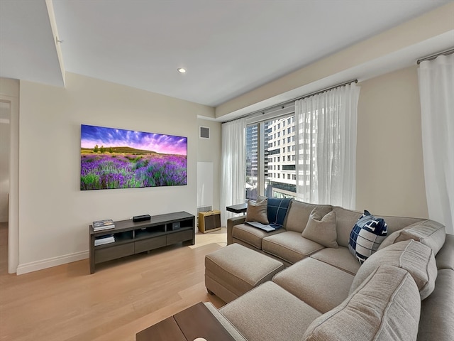 living room with light wood-type flooring