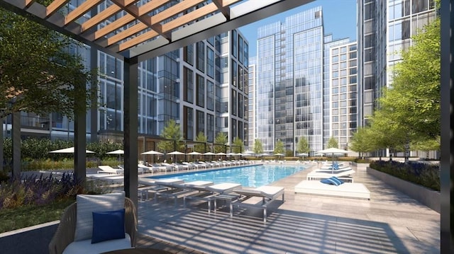 view of swimming pool with a patio and a pergola