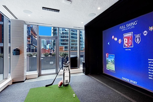 recreation room with golf simulator, carpet floors, floor to ceiling windows, and a textured ceiling