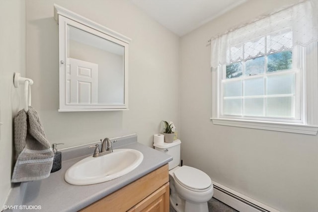 28 Myrtle St, Millis, MA 02054 - bathroom with baseboard heating, vanity, and toilet