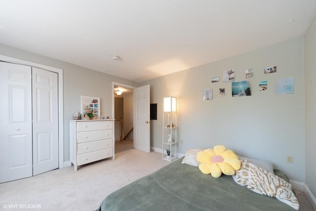28 Myrtle St, Millis, MA 02054 - bedroom with light carpet, a closet, and baseboards