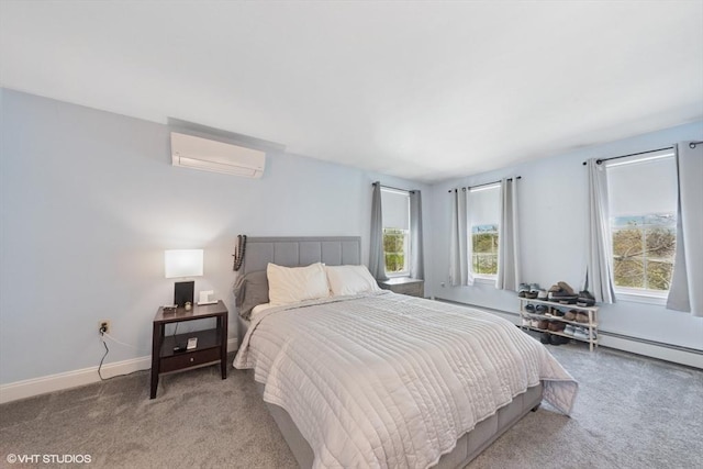 28 Myrtle St, Millis, MA 02054 - bedroom with a wall mounted AC, carpet floors, baseboards, and a baseboard radiator