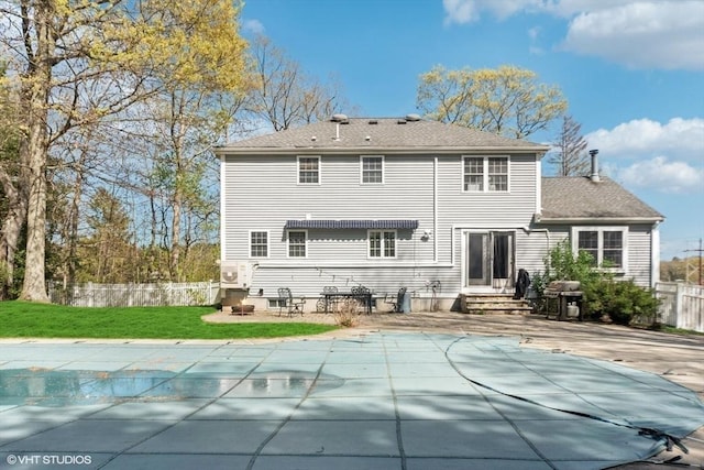 28 Myrtle St, Millis, MA 02054 - back of property with roof with shingles, entry steps, and a patio