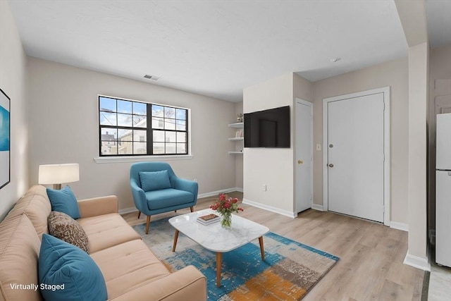 living room featuring light hardwood / wood-style flooring