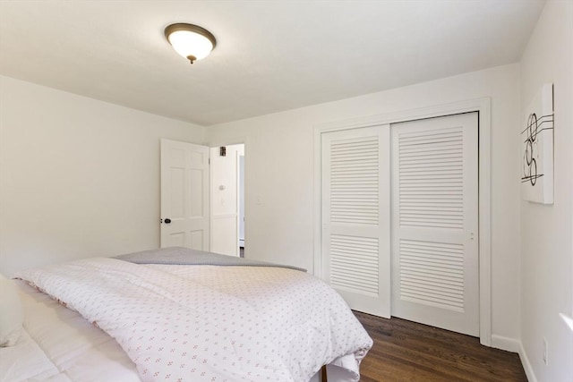 133 Jean Dr, Seekonk, MA 02771 - bedroom with a closet and dark wood-style flooring